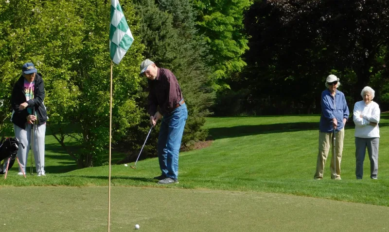 Residents playing golf