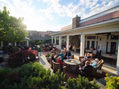 Heath Village outdoor patio filled with residents