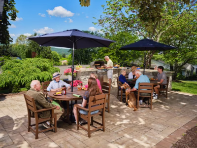 Residents and family cooking outside