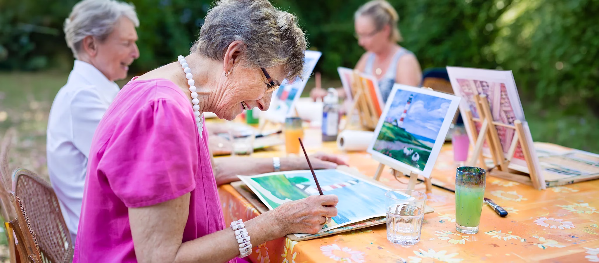 Woman painting with water colors