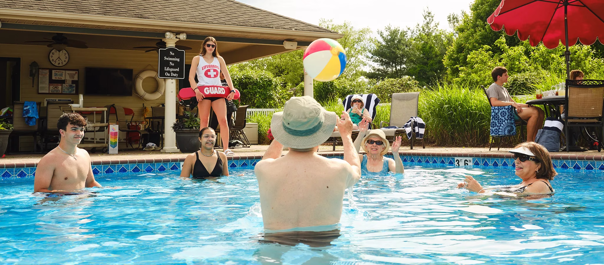 Residents and family in pool
