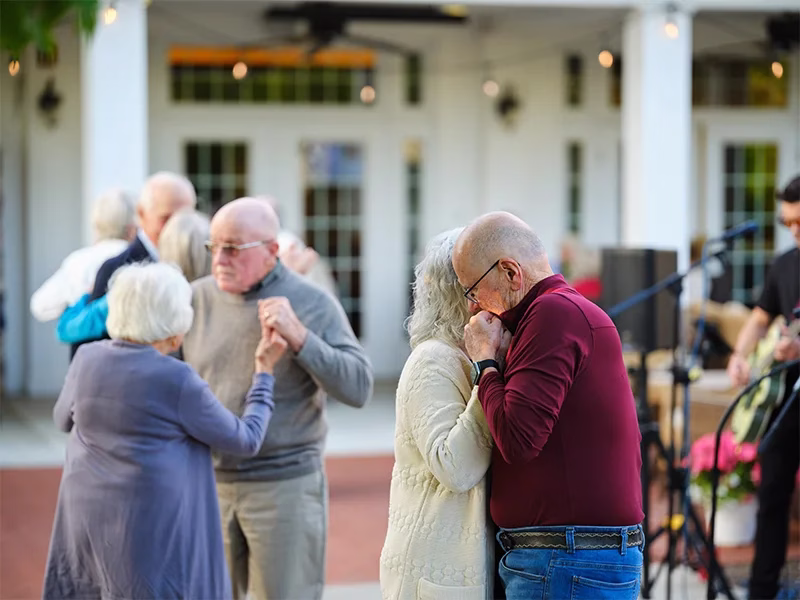 Residents dancing at outdoor event