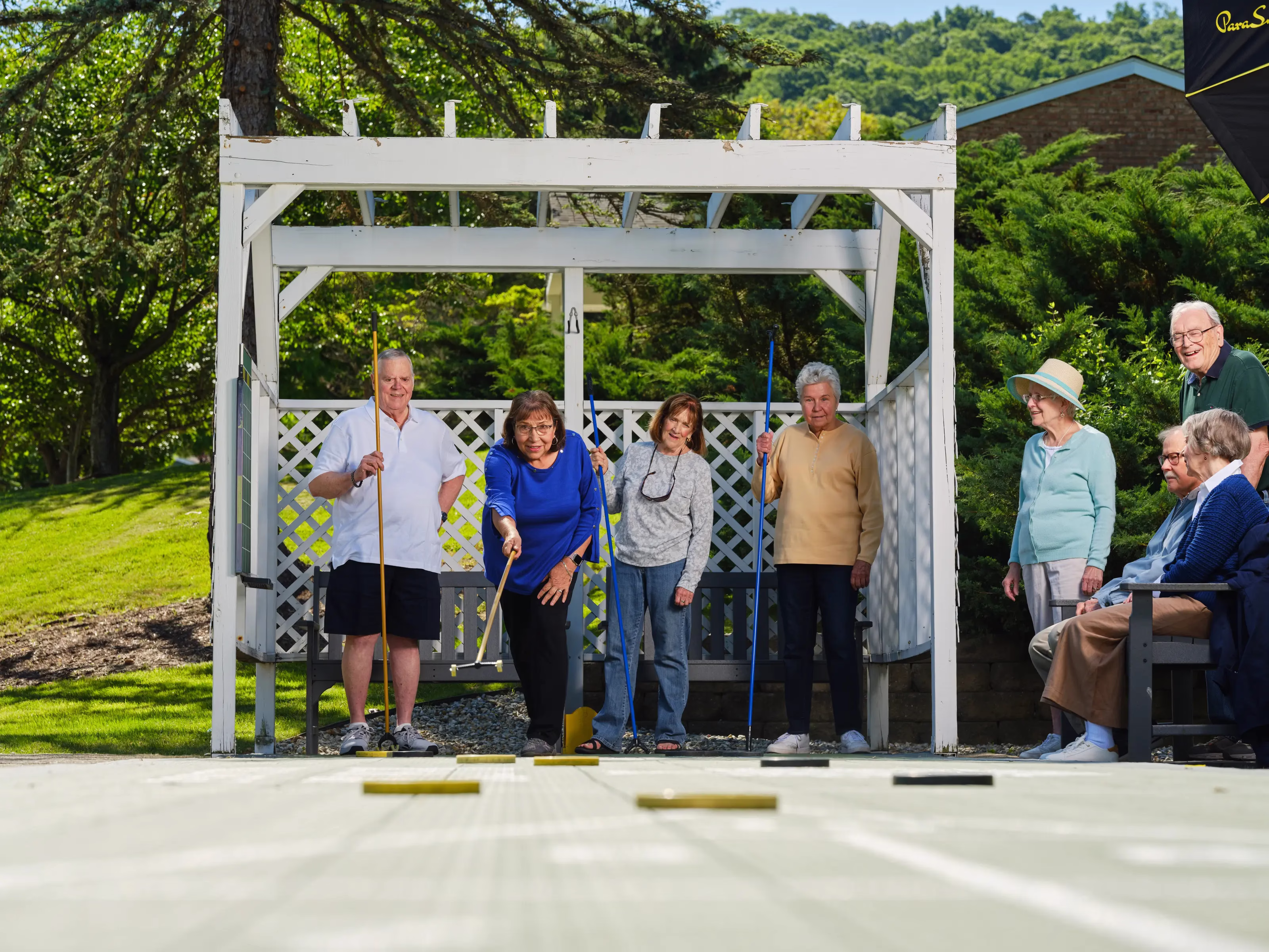 Residents playing shuffle board