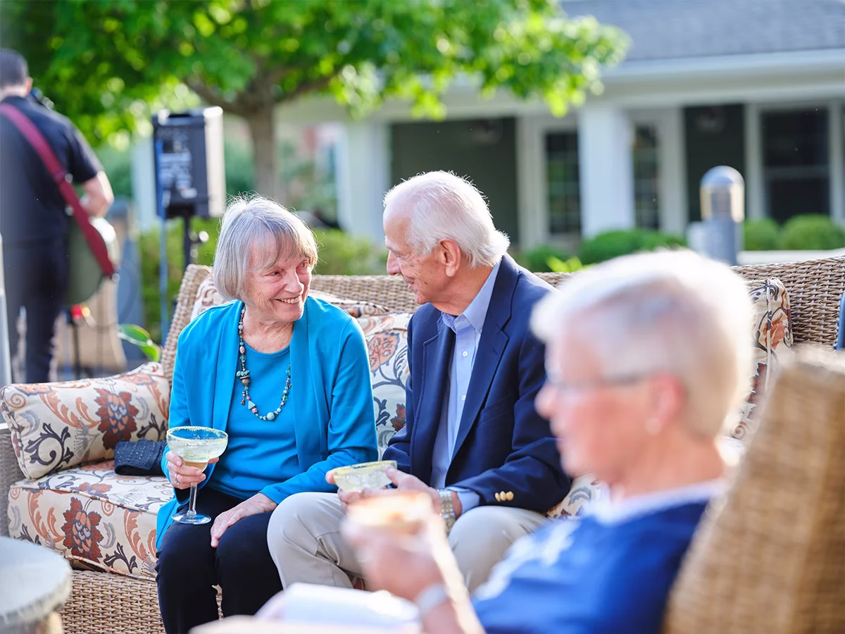 Man and woman sitting outside in conversation