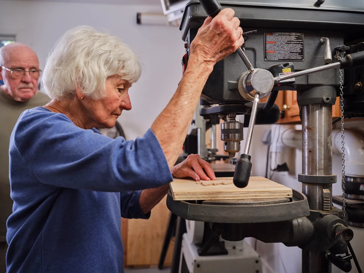 Woman working in wood shop