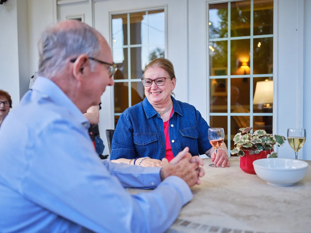 Man and woman at outdoor table
