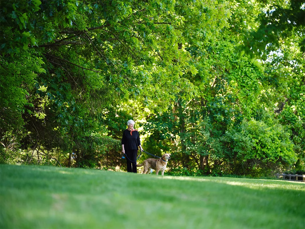 Woman outside with dog