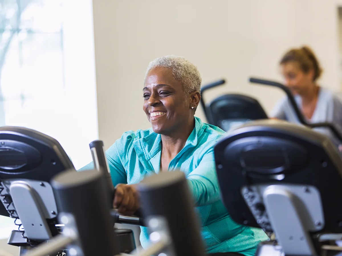 Woman using exercise equipment