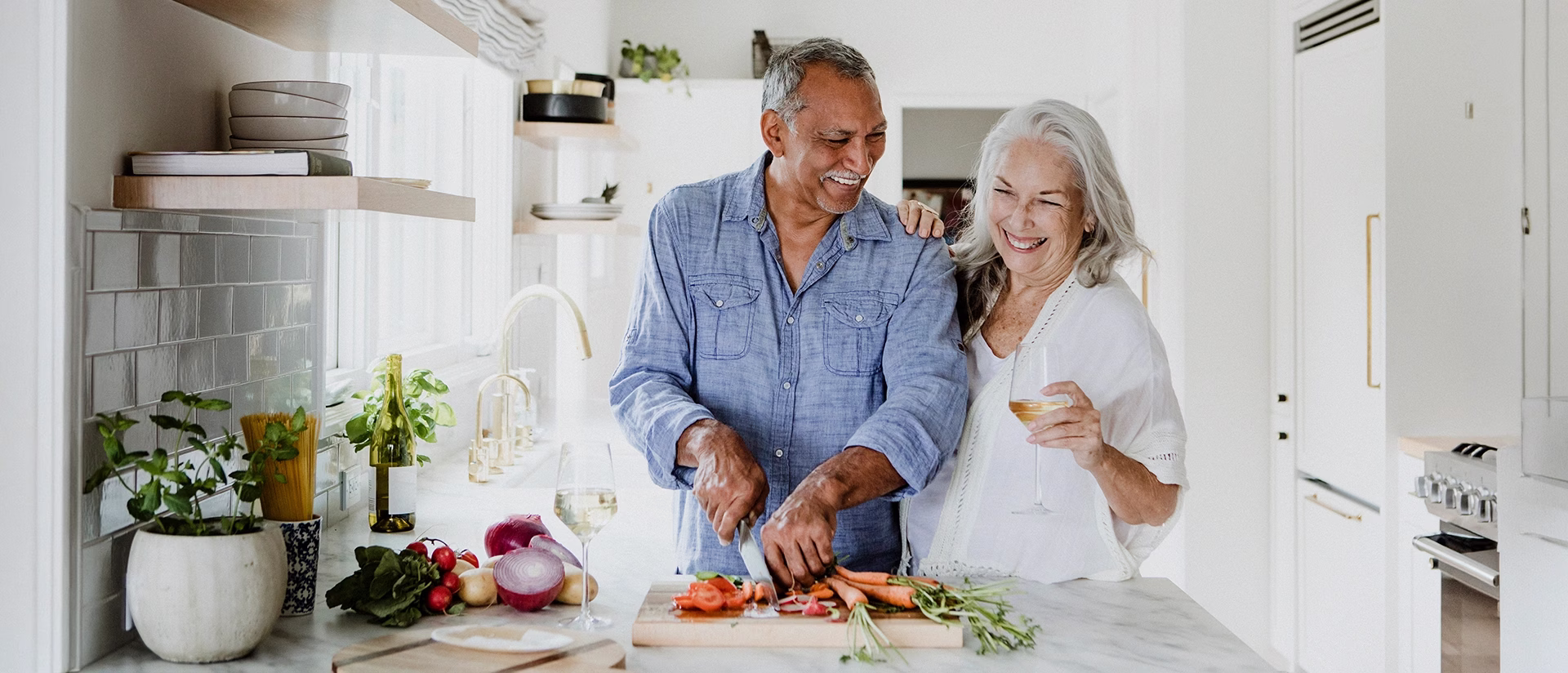 Man and woman in kitchen cooking