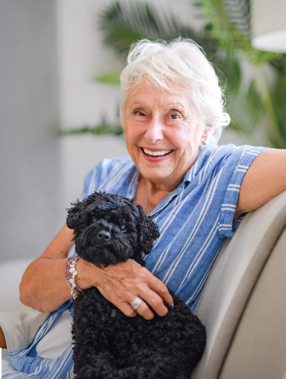 Woman and dog on couch